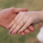 A couple displaying a Lab Diamond Engagement Ring