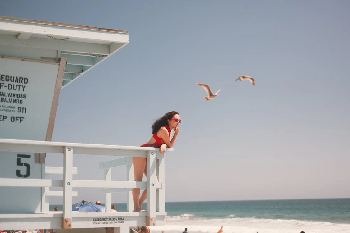 A Lifeguard watching over the beach from her post